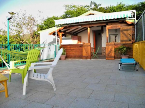 Bungalow d'une chambre avec vue sur la mer jardin clos et wifi a Deshaies